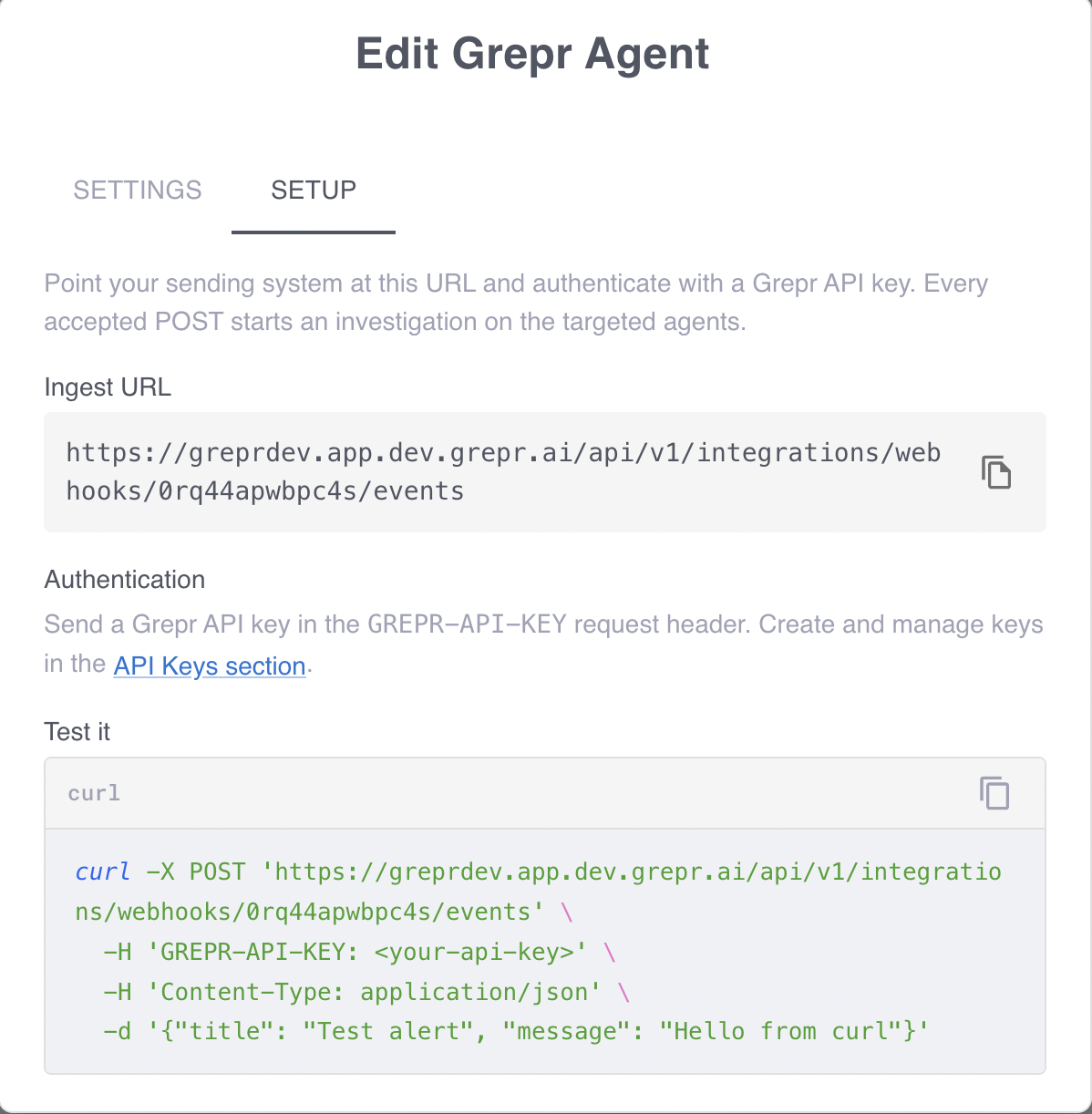 The Setup tab of a Grepr Agent integration, showing the ingest URL, the authentication header, and a test command.
